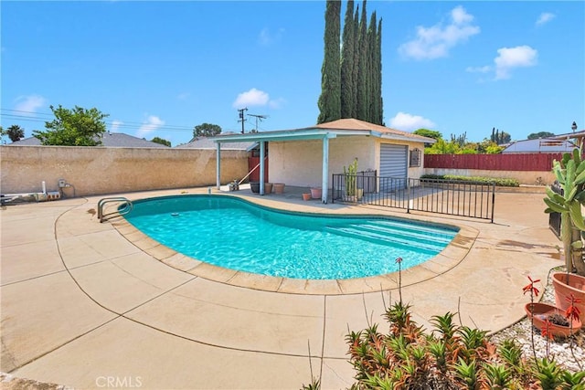 view of pool with a patio, a fenced in pool, and a fenced backyard