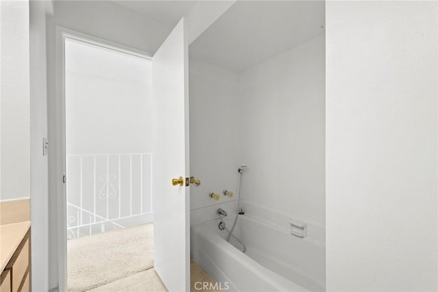 full bath with vanity, tile patterned floors, and a bath