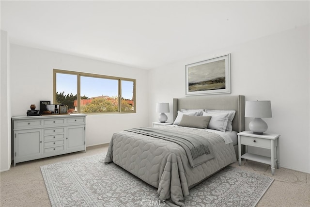 bedroom featuring baseboards and light colored carpet