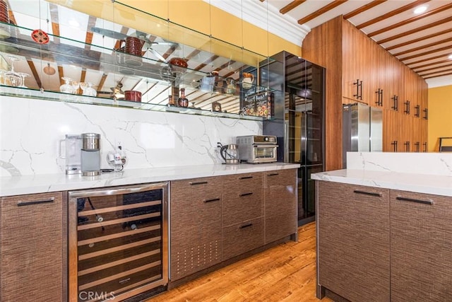 9336 Wayside Dr, Sunland, CA 91040 - bar with a toaster, decorative backsplash, light wood-style flooring, and beverage cooler