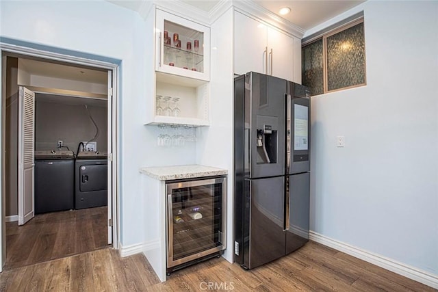 9336 Wayside Dr, Sunland, CA 91040 - kitchen featuring stainless steel fridge with ice dispenser, light countertops, beverage cooler, white cabinetry, and wood finished floors