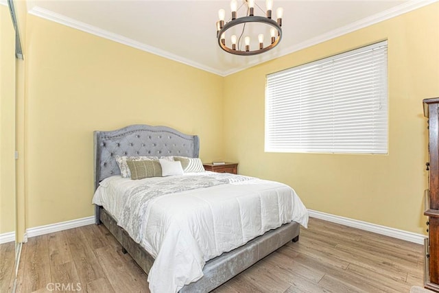 9336 Wayside Dr, Sunland, CA 91040 - bedroom featuring baseboards, ornamental molding, wood finished floors, and a notable chandelier