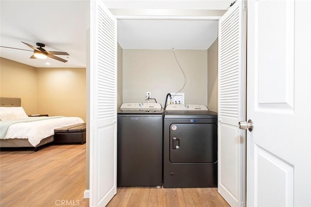 9336 Wayside Dr, Sunland, CA 91040 - laundry room featuring light wood-style floors, ceiling fan, laundry area, and washer and dryer