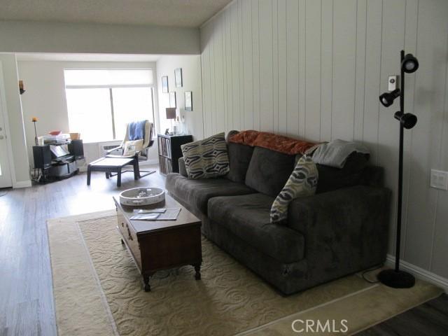13730 Annandale Dr Unit M1-30G, Seal Beach, CA 90740 - living area featuring baseboards and wood finished floors