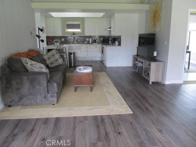 13730 Annandale Dr Unit M1-30G, Seal Beach, CA 90740 - living room with dark wood-type flooring