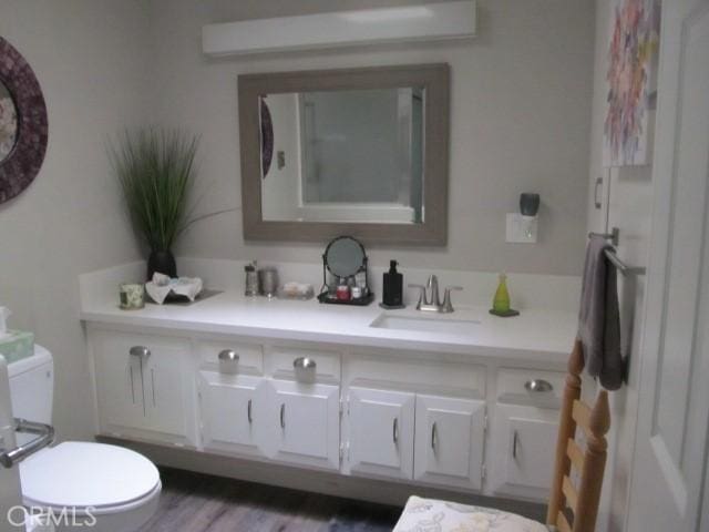 13730 Annandale Dr Unit M1-30G, Seal Beach, CA 90740 - bathroom featuring toilet and vanity