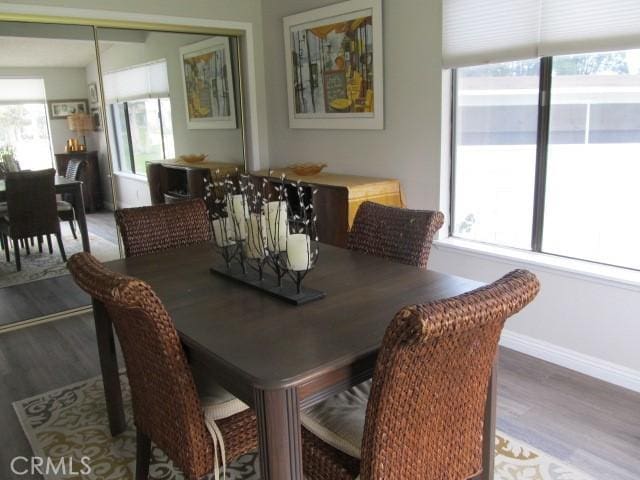 13730 Annandale Dr Unit M1-30G, Seal Beach, CA 90740 - dining room featuring baseboards and wood finished floors