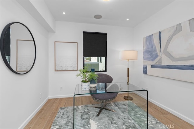 office featuring baseboards, recessed lighting, and wood finished floors