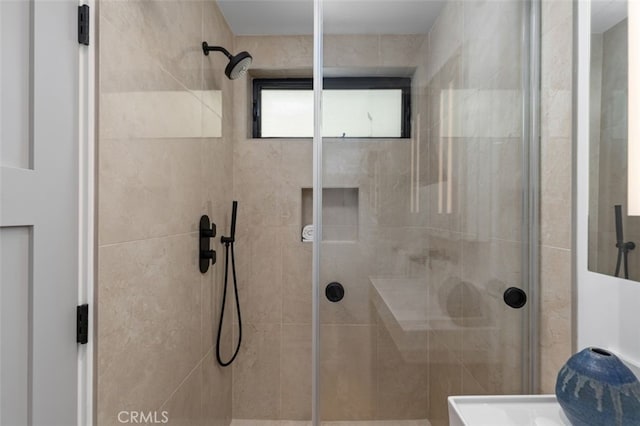 full bathroom with a shower stall