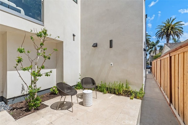 view of patio with fence