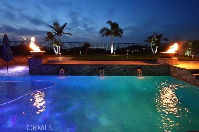 13504 Planet Ct, Riverside, CA 92503 - view of swimming pool featuring fence