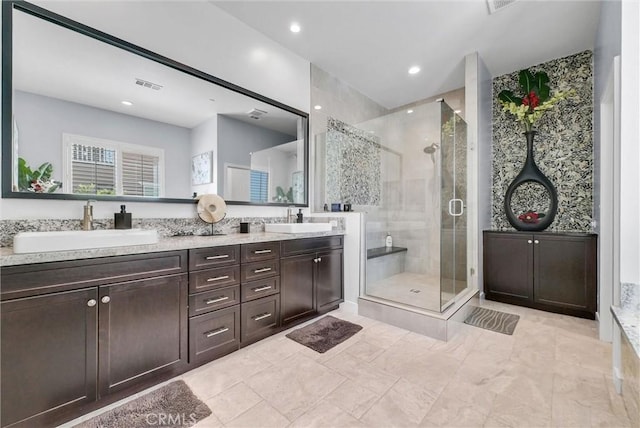 13504 Planet Ct, Riverside, CA 92503 - bathroom featuring a stall shower, double vanity, and recessed lighting