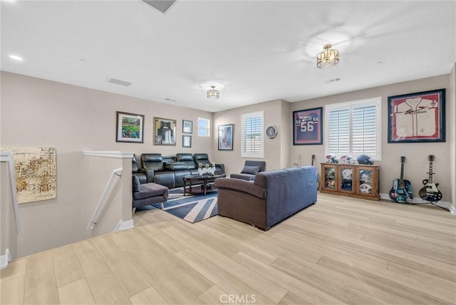 13504 Planet Ct, Riverside, CA 92503 - living room featuring wood finished floors and baseboards