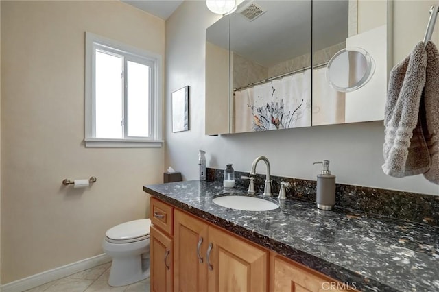 full bath with visible vents, vanity, toilet, baseboards, and tile patterned floors
