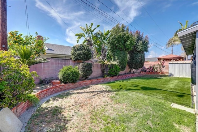view of yard with fence
