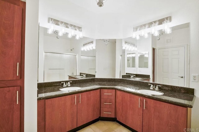 1465 C St Unit 3604, San Diego, CA 92101 - bathroom featuring double vanity, a shower stall, and tile patterned flooring