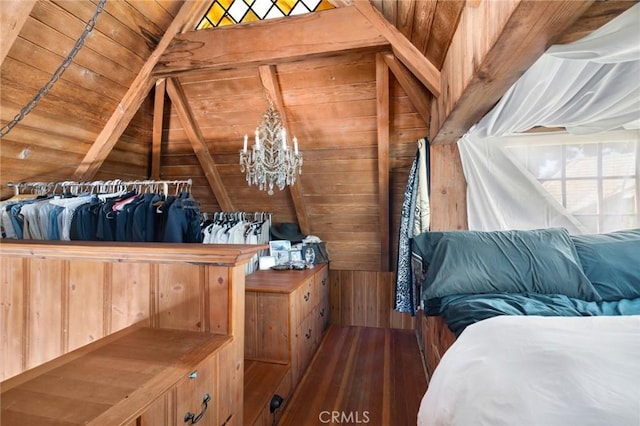 bedroom with wood ceiling, vaulted ceiling, wood walls, and a chandelier