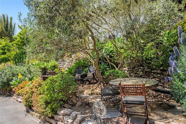 view of patio featuring outdoor dining space