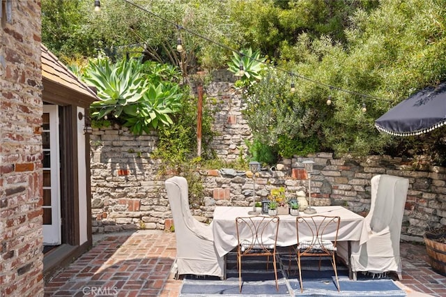 view of patio with outdoor dining area