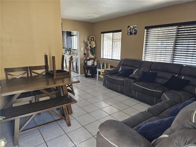 living area with light tile patterned floors