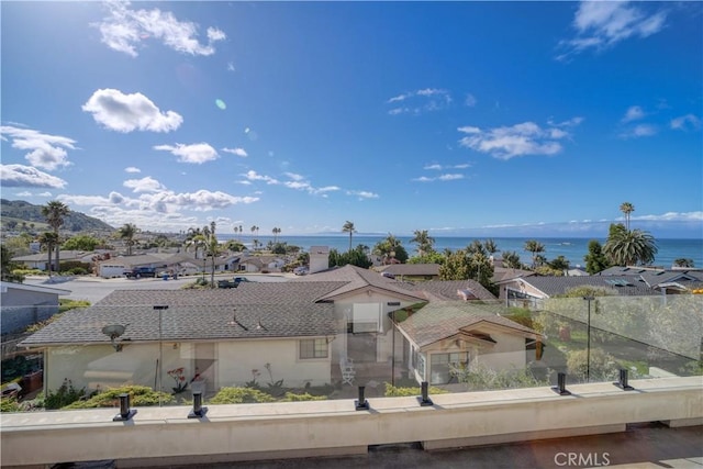 water view featuring fence and a residential view