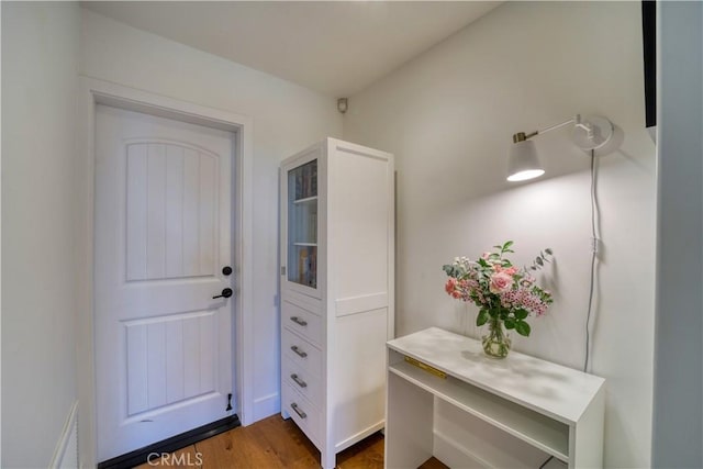 entryway featuring dark wood-style floors