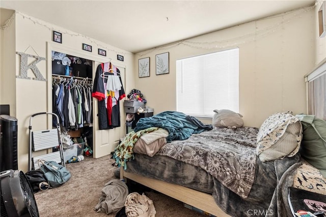 carpeted bedroom with a closet