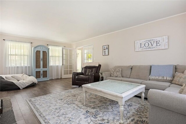 11414 Golden Gate Dr, Yucaipa, CA 92399 - living room with wood finished floors and crown molding