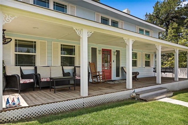 exterior space featuring a porch and outdoor lounge area