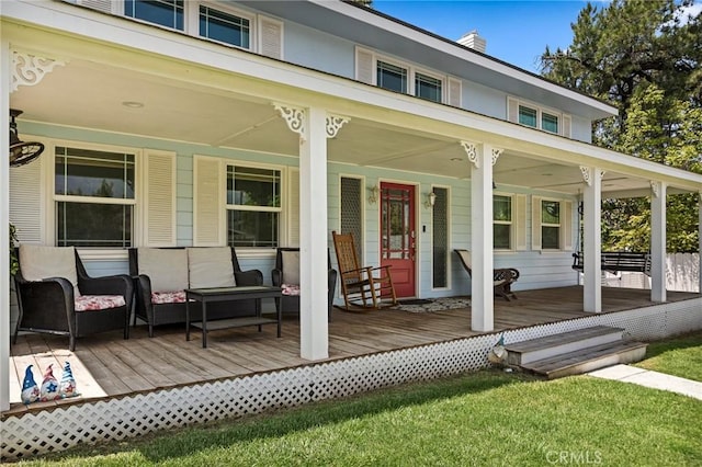 11414 Golden Gate Dr, Yucaipa, CA 92399 - porch featuring outdoor lounge area and a yard