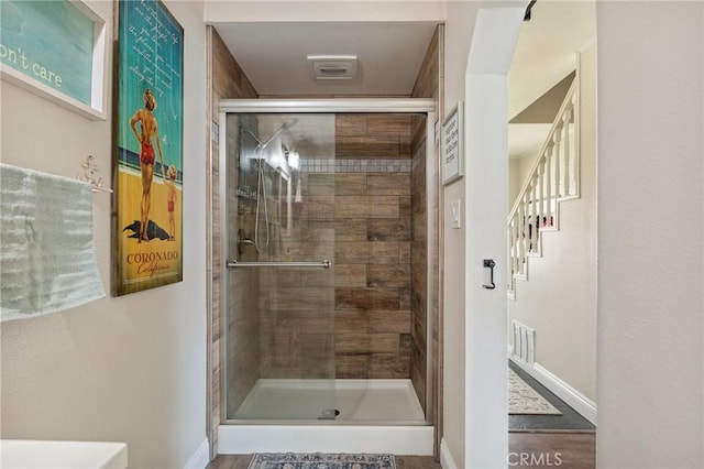 11414 Golden Gate Dr, Yucaipa, CA 92399 - bathroom with a shower stall and baseboards