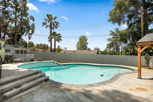 11414 Golden Gate Dr, Yucaipa, CA 92399 - view of swimming pool with a fenced backyard and a patio area