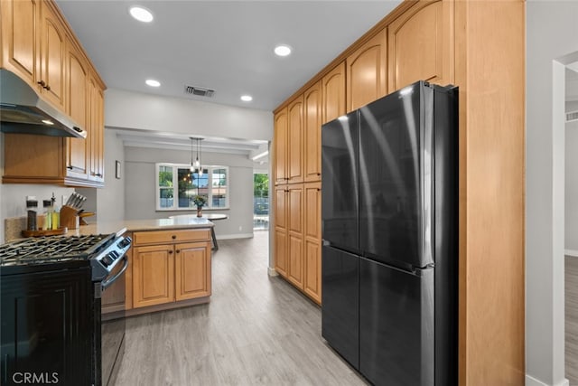 17441 Rayen St, Sherwood Forest, CA 91325 - kitchen featuring gas stove, freestanding refrigerator, a peninsula, light wood-type flooring, and under cabinet range hood