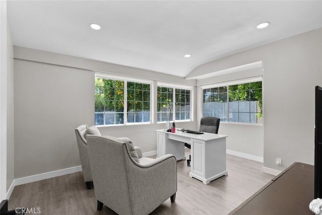 17441 Rayen St, Sherwood Forest, CA 91325 - office area with baseboards, light wood-style flooring, and a healthy amount of sunlight