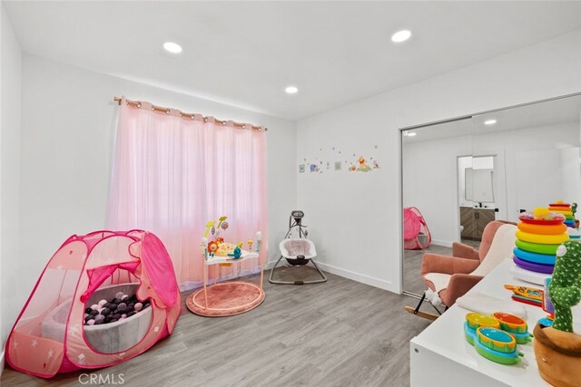 17441 Rayen St, Sherwood Forest, CA 91325 - playroom with baseboards, recessed lighting, and wood finished floors