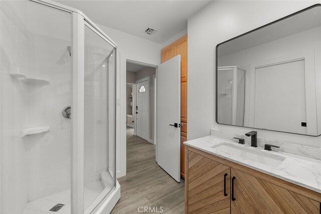 17441 Rayen St, Sherwood Forest, CA 91325 - bathroom featuring vanity, a shower stall, and visible vents
