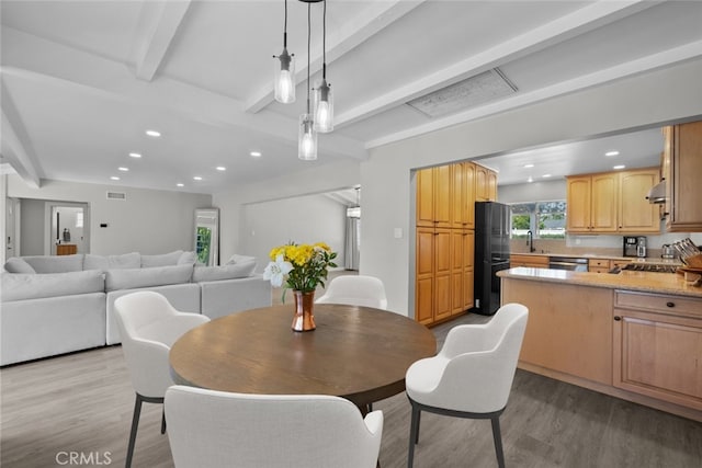 17441 Rayen St, Sherwood Forest, CA 91325 - dining area featuring recessed lighting, beamed ceiling, visible vents, and wood finished floors