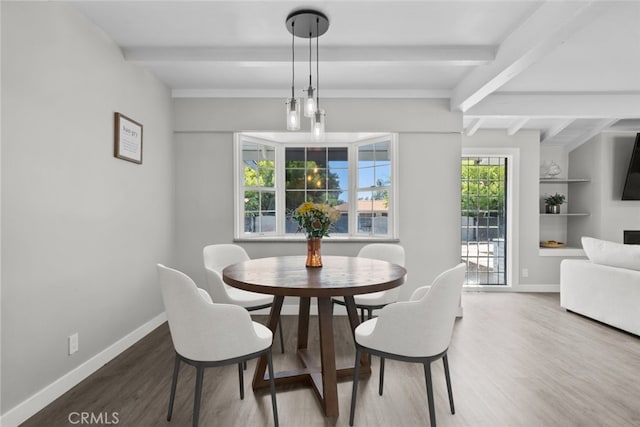 17441 Rayen St, Sherwood Forest, CA 91325 - dining space with baseboards, beamed ceiling, and wood finished floors