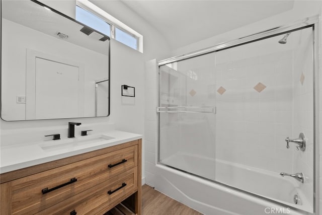 17441 Rayen St, Sherwood Forest, CA 91325 - full bathroom with vanity, shower / bath combination with glass door, and wood finished floors