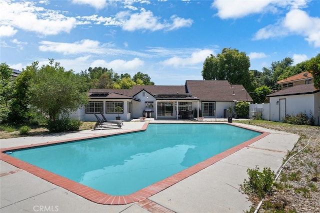 17441 Rayen St, Sherwood Forest, CA 91325 - pool featuring fence and a patio