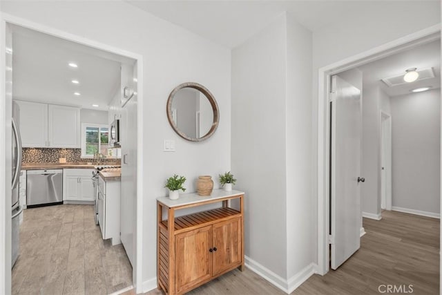 18012 Falda Ave, Torrance, CA 90504 - corridor featuring light wood-style floors and recessed lighting