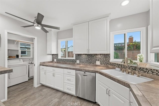 18012 Falda Ave, Torrance, CA 90504 - kitchen featuring a ceiling fan, backsplash, stainless steel dishwasher, a sink, and white cabinets