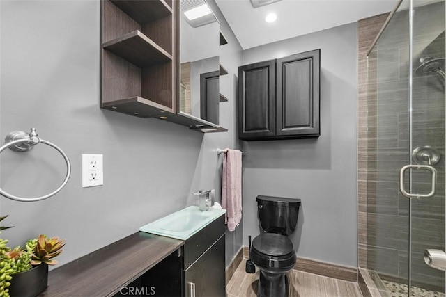 18012 Falda Ave, Torrance, CA 90504 - full bathroom featuring vanity, baseboards, a stall shower, and toilet