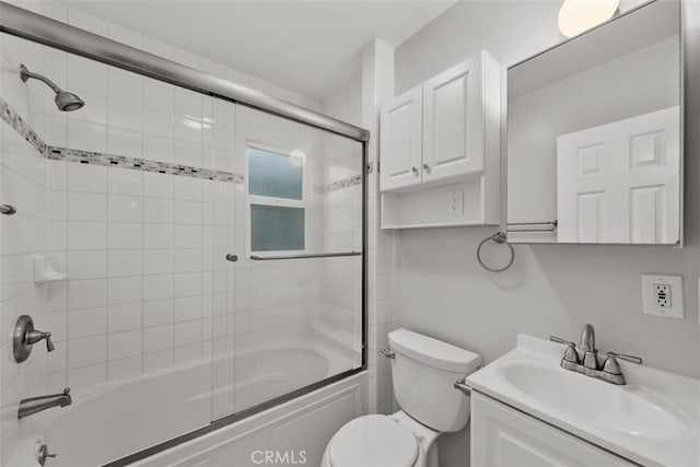 18012 Falda Ave, Torrance, CA 90504 - bathroom featuring vanity, shower / bath combination with glass door, and toilet