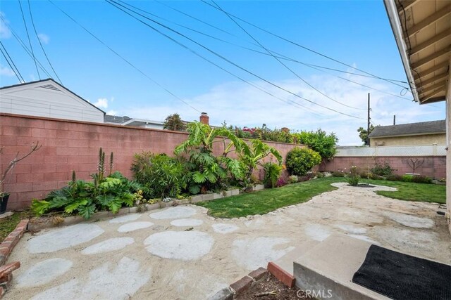 18012 Falda Ave, Torrance, CA 90504 - fenced backyard featuring a patio
