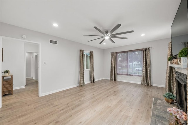 18012 Falda Ave, Torrance, CA 90504 - living room with ceiling fan, a fireplace, light wood-style floors, and recessed lighting