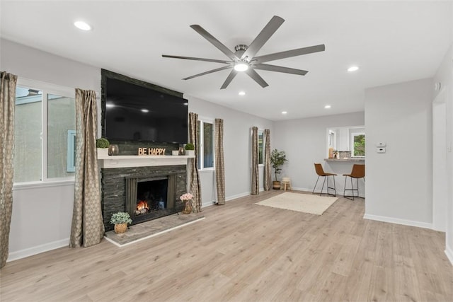 18012 Falda Ave, Torrance, CA 90504 - unfurnished living room with ceiling fan, a fireplace, wood finished floors, and recessed lighting