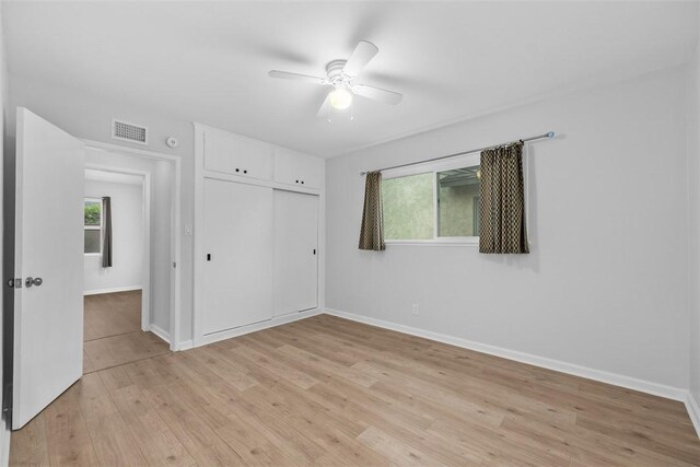 18012 Falda Ave, Torrance, CA 90504 - unfurnished bedroom featuring light wood-style flooring, a closet, and a ceiling fan