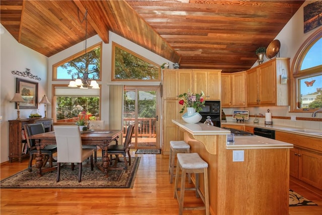 1660 Saint Thomas Ave, Cambria, CA 93428 - kitchen with a chandelier, light countertops, light wood-style flooring, wood ceiling, and a sink