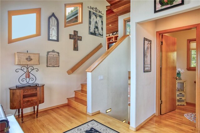1660 Saint Thomas Ave, Cambria, CA 93428 - staircase with wood finished floors and baseboards
